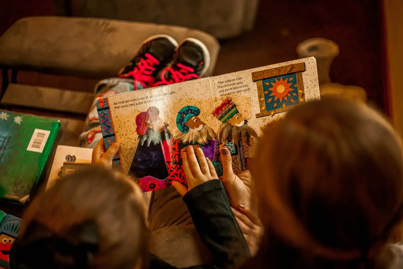 Children looking at a picture book together